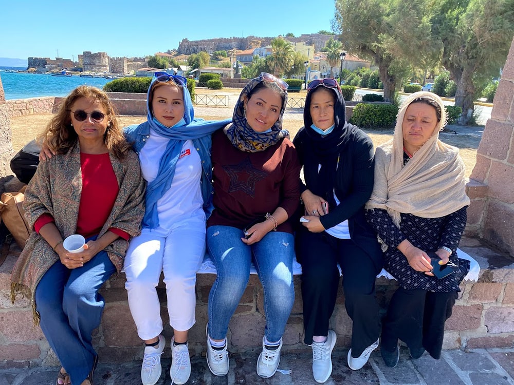 Helping to build a lifeline to a better future, FIU Business professor works with Afghan refugees in Greece.